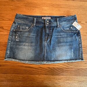 Denim Mini Skirt NWT Jr Sz 13.  - distressed with jewels designs